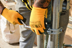 Scaffolder wearing scaffolding gloves