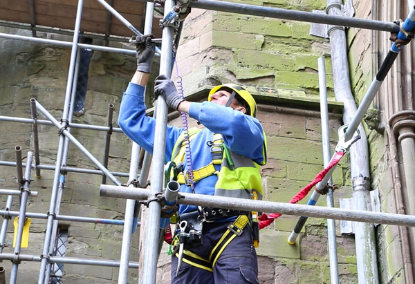 Scaffolder with tethered tools