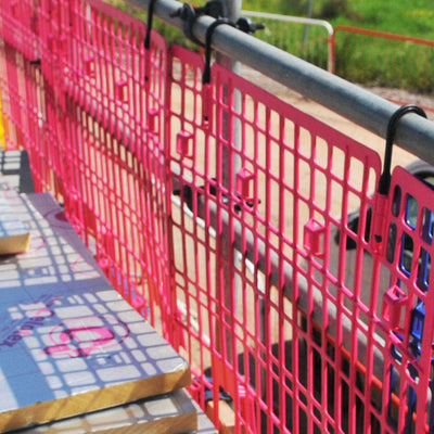 Pink plastic brick guard installed on site