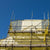 Yellow BIGBEN Superclad® Debris Netting in use of scaffold