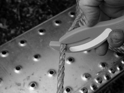 BIGBEN® Fish Safety Knife cutting through rope