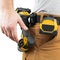 Spider Tool Holster attached to belt, holding drill and tape measure